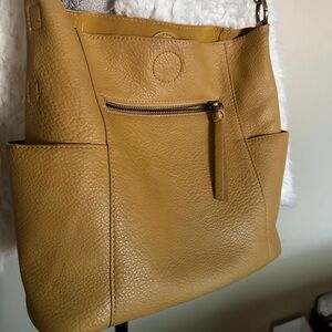 Mustard Yellow colored Vegan Leather Shoulder Bag. Includes pochette.
